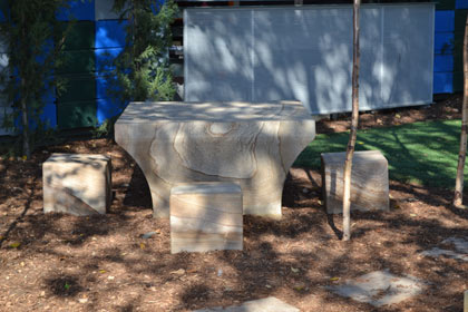 Sculptured garden with  retaining wall made from sized sandstone