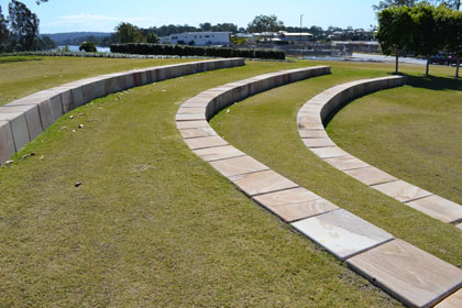 Sculptured garden with  retaining wall made from sized sandstone